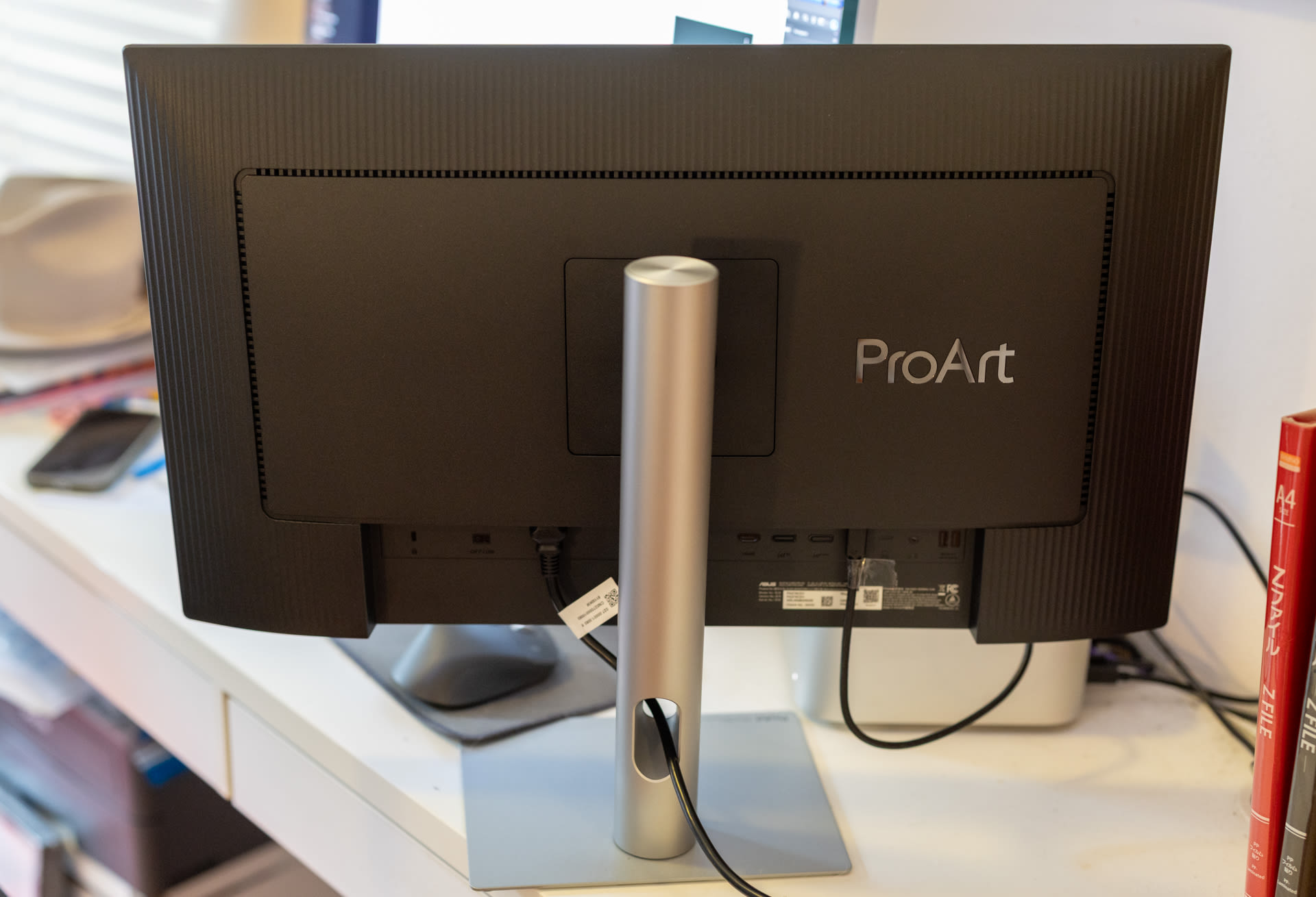 The backside of monitors are rarely glamorous – though the looks neat. The adjustments allow at least 12cm of vertical height change (much lower and higher than a Apple Studio Display). Vertical orientation is very easy – just grab and edge and slowly spin it. Image: Tim Levy
