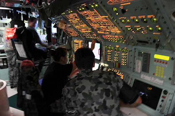 Crew in the operations room of a Collins Class submarine. Credit: ADM Katherine Ziesing.
