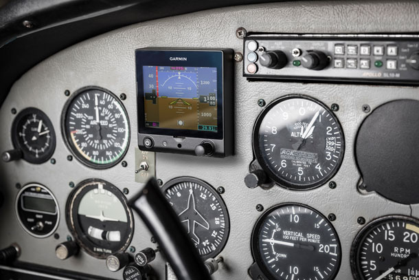 Garmin's G5 Primary Flight Display (PFD) fitted to the traditional panel of a Grumman AA5B Tiger. (Garmin)