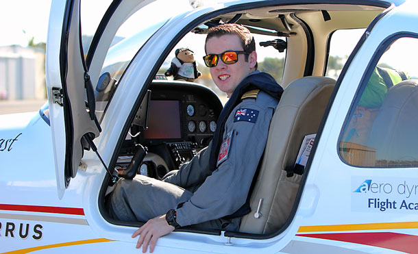 Lachie Smart in the cockpit of the SR22 he is using to fly around the world. (Wings Around the World)