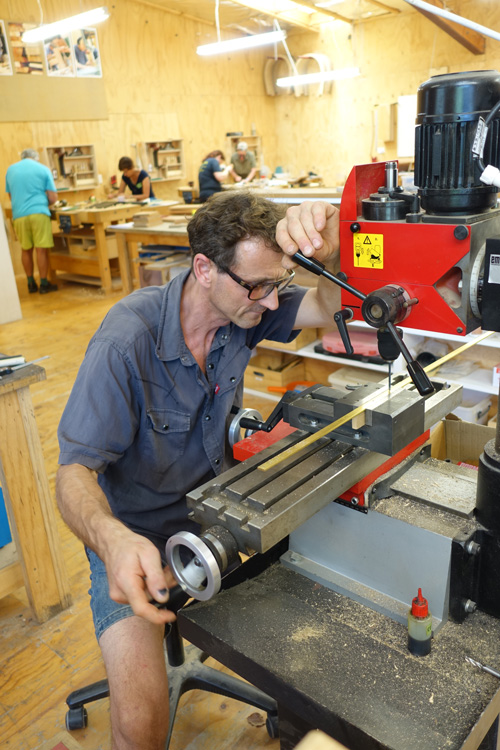 Lance Palmer completing a lid stay for a chest completed at the school.