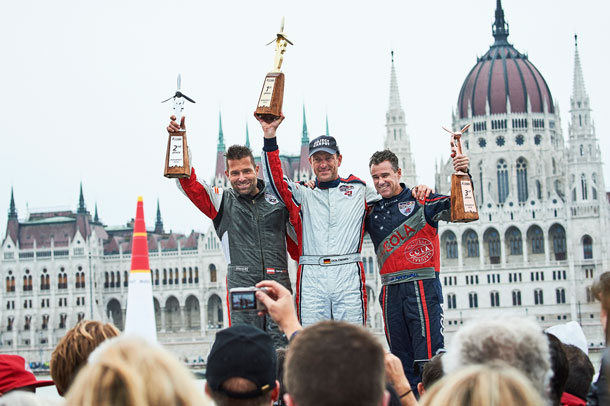 Hannes Arch, Matthias Dolderer and Matt Hall on the podium after the fourth round of the 2016 Red Bull Air Race World Championship in Budapest. (Red Bull Content Pool/Armin Walcher)