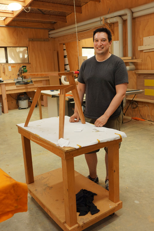 Robert Godoy with one of the pieces that will shown at the exhibition of graduate work opening December 7, 2017.