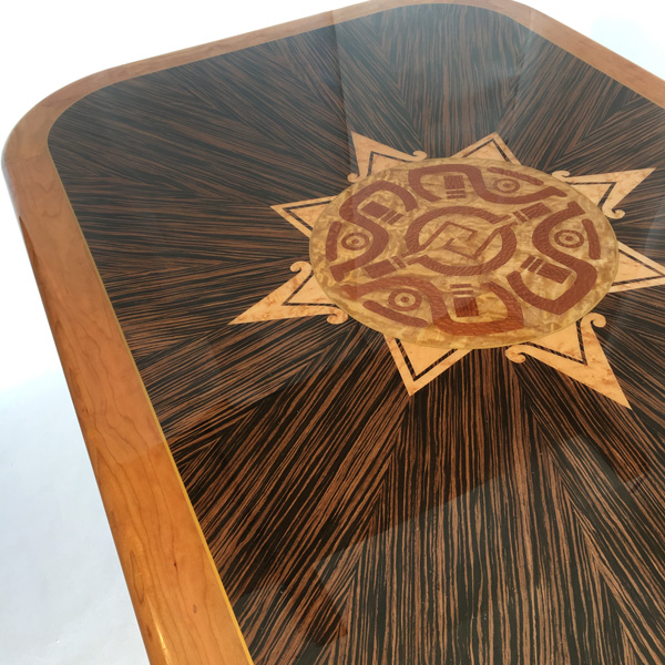 Gavin Harrington, Unity table and chairs, Macassar ebony with solid cherry edging. Gavin was awarded first prize by Oneida Air Systems and Fine Woodworking Magazine in their American Craftsmen Showcase for this piece.