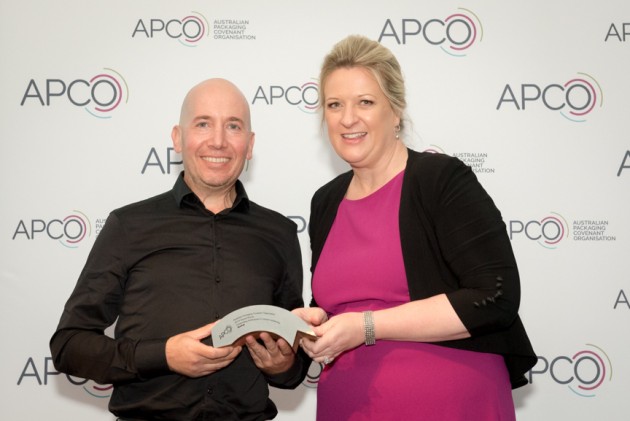 Richard Fine receives the BioPak award from Brooke Donnelly.