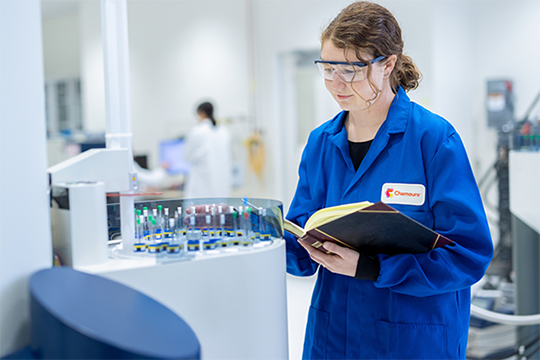 Staff working inside a Chemours lab.