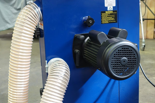 Dust collection is via two 100mm ports at the rear.
