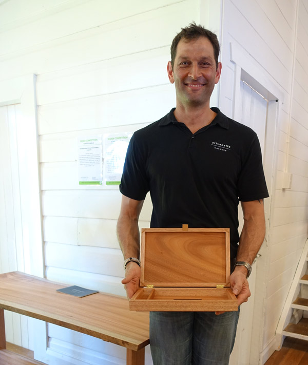 Brisbane designer maker Dante Stivanello with his desktop companion made from Qld maple.