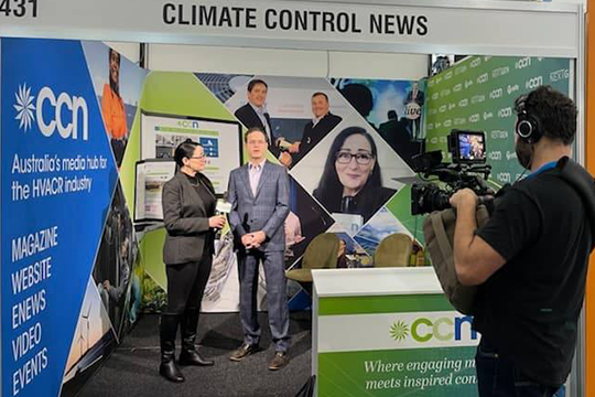 CCN editor Sandra Rossi talks to David Ferrari on the CCN stand at ARBS 2022. Image: CCN