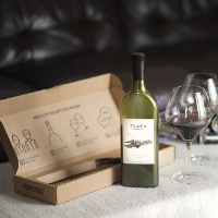 Flat Wine Bottle (Delivering Happiness Limited&rsquo;s T/A Gar&ccedil;on Wines)
Delivering Happiness Limited, a British company trading as Gar&ccedil;on Wines, is the inventor and granted IP holders of a flat wine bottle, which is specifically designed for e-commerce in the UK so that it could fit through mail slots, or letterboxes, in the doors of UK homes. The primary package, a slender 750 mL recycled PET bottle, lays flat in a dye-cut cavity in the same shape as the bottle within the postal pack in which it gets delivered. Using 100 percent post-consumer recycled PET instead of glass significantly reduces shipping weight and cost, eliminates potential breakage in transit and offers a more eco-friendly packaging material solution than regular plastic or glass.