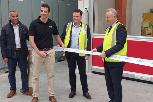 Jason Brown (2nd left) cuts the ribbon, with (l-r) Parag Patel from ePac USA, Craig Walmsley from HP, and local councillor Oscar Yildiz.