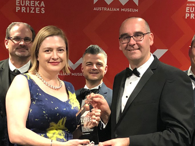 Chief Defence Scientist Professor Tanya Monro presents the Eureka prize to Team Grey Scan. Credit: DST