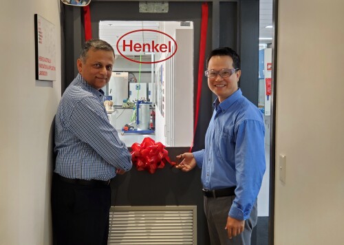 Aamir Qureshi (L), operations & supply-chain manager, and Stephen Liu (R), product development chemist, cutting the ribbon to mark the official opening of the upgraded lab.