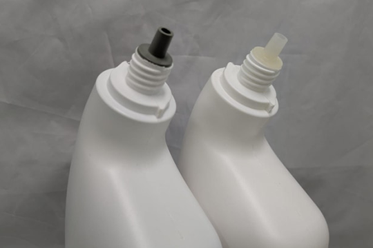 The grey Liquid Toilet Cleaner Dispensing Plug (left hand bottle)  is made entirely from 100% Australian household recycled soft plastic resin.