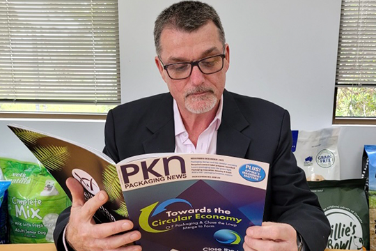 Joe Foster, CEO of new entity Close The Loop Group, reads the latest issue of PKN, hot off the press!