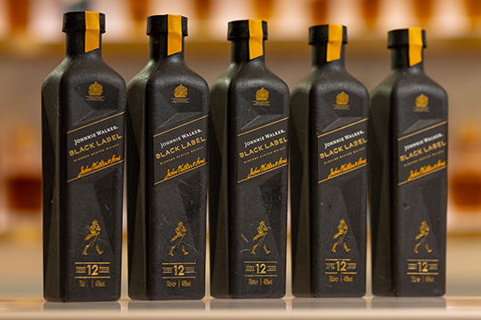 Diageo has launched a first-of-its-kind 90% paper-based bottle trial for Johnnie Walker Black Label.