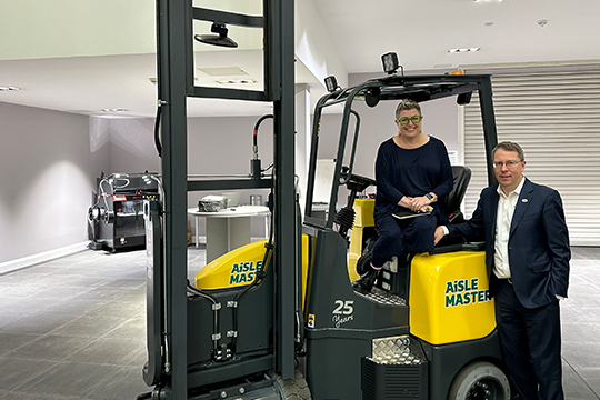 Kim Berry contemplates a career change, with Combilift co-founder and CEO, Martin McVicar.