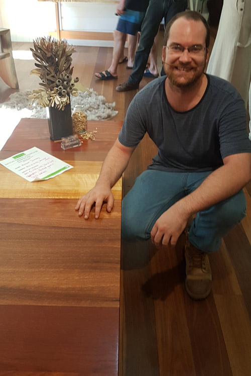 Laurent Le Pochat with his coffee table of many species.