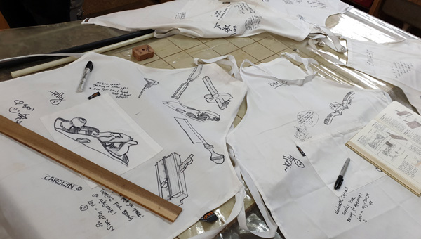 On the last day memento aprons were left out for participants to sign and leave messages on.