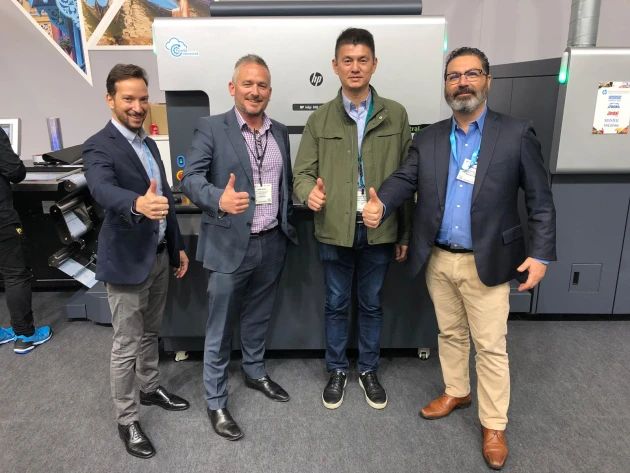Next into labels: Romeo Sanuri (2nd right) at Labelexpo with (l-r) Yoav Lotan, HP; Mark Daws, Currie Group; and Rafael Kraus, HP.