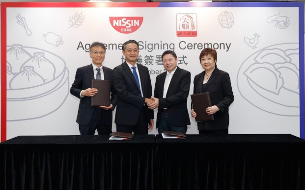 Official signing of Nissin Foods Company&rsquo;s acquisition of ABC Pastry (l-r): Nissin Foods executive director and CFO, Shinji Tatsutani, Nissin Foods executive director, chair, and CEO, Kiyotaka Ando, ABC Pastry director and GM, Peter Gao, and Min Investments director, Tong Wu. (Image: Nissin Foods Co)