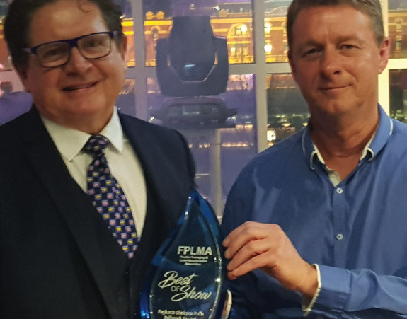 Best in Show for Flexo winner: Phillip Rolls (left), RollsPack, receives the Award from Vince Sedunary, FPLMA