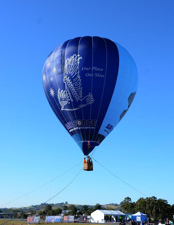 With virtually no wind on the Sunday morning, the RAAF was offering tethered balloon rides to the general public. (Steve Hitchen)