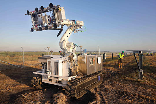 The robot can install 350 to 400 modules per eight hour shift with a two man human crew working alongside.