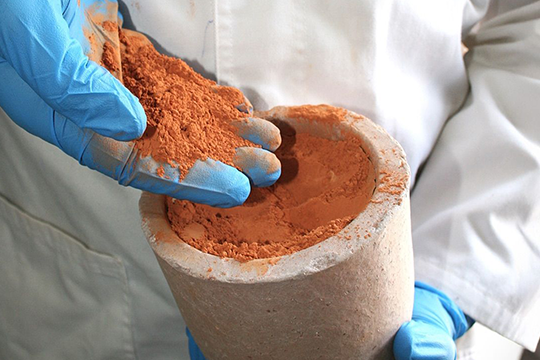 The combined clay mix after being heat treated, ready for use as a cement supplement.