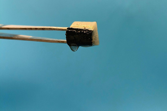The spongy material, which is an early-stage lab prototype, absorbs moisture from the atmosphere.