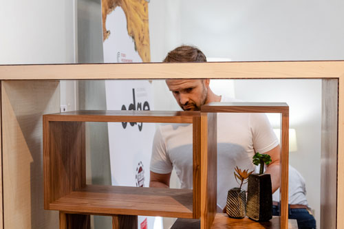Qld designer maker Ross Williamson admires Thirston Morris&rsquo;s Rand cabinet. Photo: Julijana Griffiths