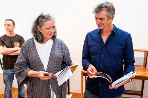 SWA members Ruth Thompson and Tony Kenway peruse the catalogue which accompanies the exhibition. Photo: Julijana Griffiths