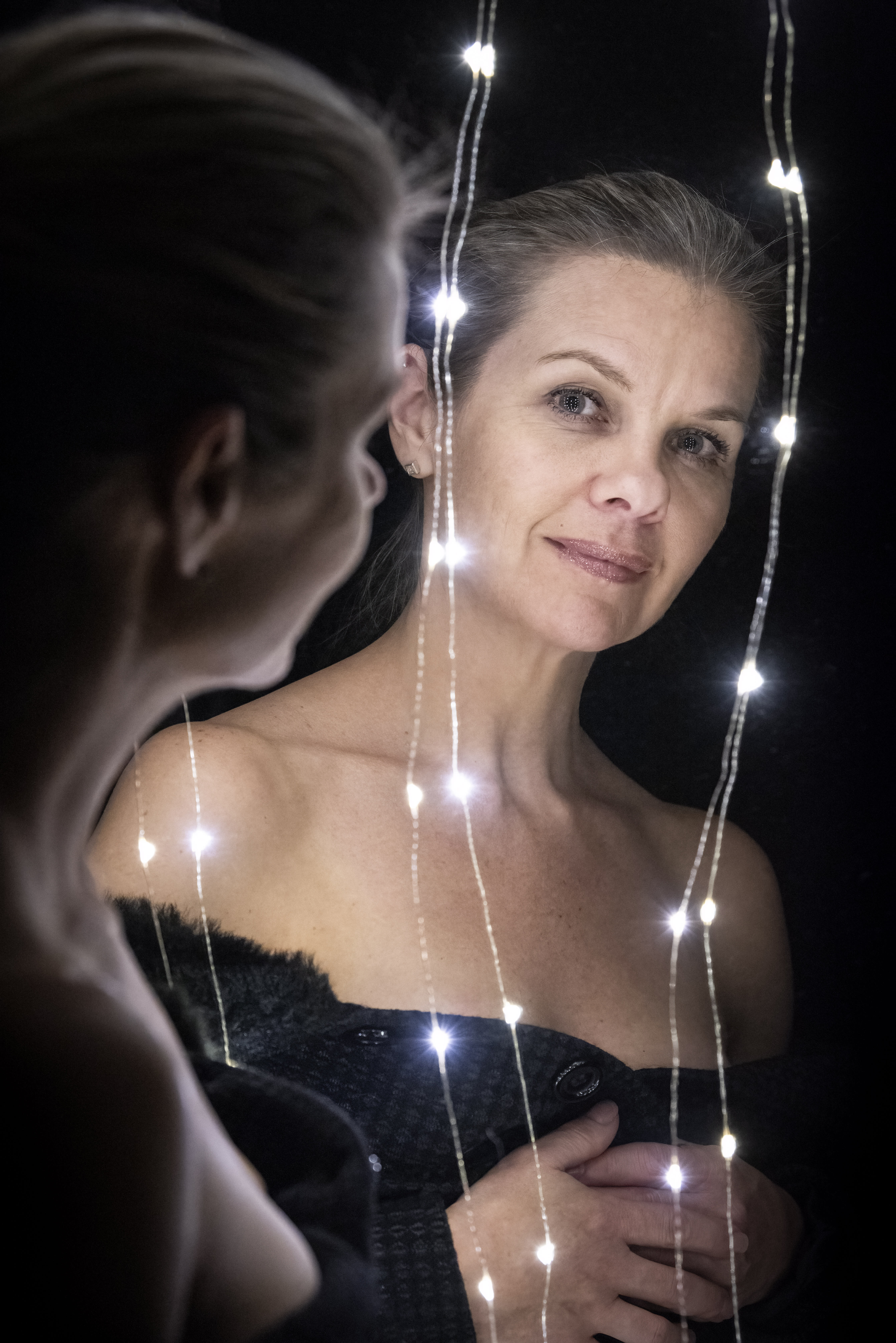 This portrait of my friend Sheree was made using cheap LED lights that can be bought online for as little as $10. I attached the LEDs to a mirror and then photographed Sheree in the reflection. Each LED represents a tiny point of light, but because there are dozens of LEDs all approaching the subject from different angles, the effect is a rather soft light. Nikon D810, Nikon 70-200mm f2.8 lens @ 105mm. 1/100s @ f5.6, ISO 6400.