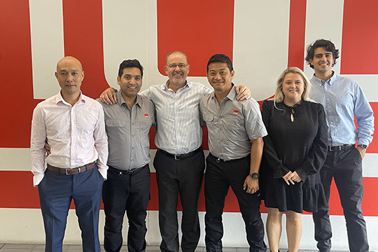 John Jakovcevic (centre) and the STULZ team.