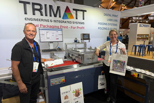 Matt Johnson and Mel McFarlane on the Trimatt stand at PacPrint.