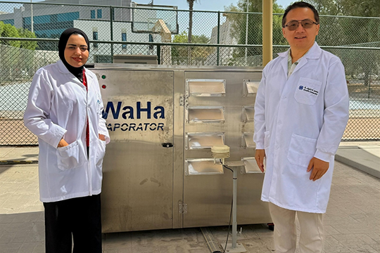 Dr. Samar Abdelwadood, and Professor Samuel Mao, in front of the WaHa Vaporator on the campus. (Photo: AETOSWire)