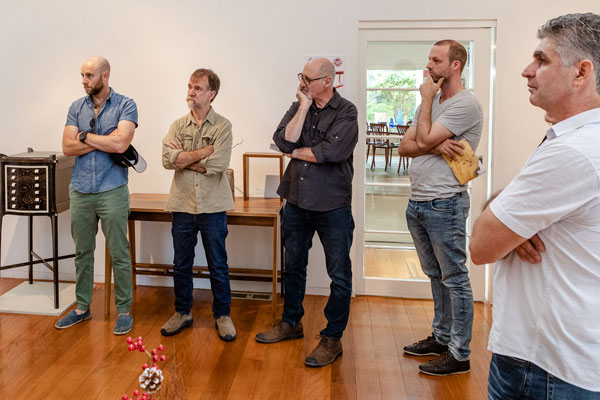 Could this be one of the &lsquo;polarising&rsquo; moments that Ian Higgs refers to? Left to right: SWA members and exhibitors Warwick Jones, Ian Higgs, Will Matthysen, Tim Noone, Kanun Onsel. Photo: Julijana Griffiths