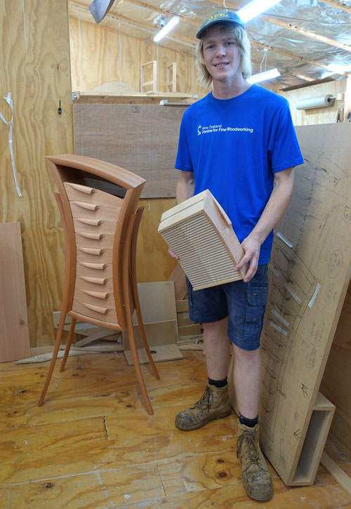 Scholarship winner Will Bayliss with his cabinet of curves.