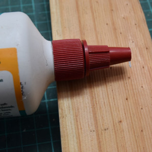 2. Measure depth of glue bottle spout.