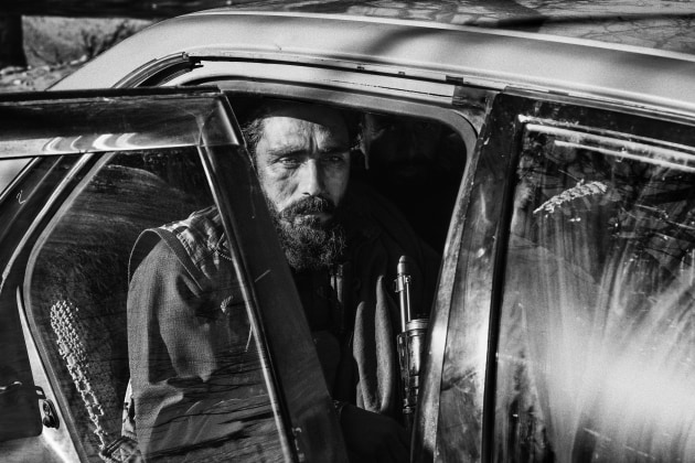 &copy; Lorenzo Tugnoli, Italy, Contrasto, for The Washington Post. The Longest War. A Taliban fighter sits in a car in Khogyani, Afghanistan, in the morning of 11 December 2019.