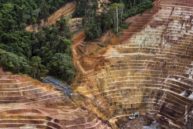 Amazon: Paradise Threatened. &copy; Daniel Beltr&aacute;. 
ENVIRONMENT - THIRD PRIZE, STORIES.
After declining from major peaks in 1995 and 2004, the rate of deforestation in the Brazilian Amazon increased sharply in 2016, under pressure from logging, mining, agriculture and hydropower developments. The Amazon forest is one of Earth&rsquo;s great &lsquo;carbon sinks&rsquo;, absorbing billions of tonnes of carbon dioxide each year and acting as a climate regulator. Without it, the world&rsquo;s ability to lock up carbon would be reduced, compounding the effects of global warming.
20 January  2017. Zamapa iron ore strip mine, just 30 kilometers from the Tumucumaque National Park in Amap&aacute;, Brazilian Amazon. In August, President Michel Temer issued a decree allowing mining across a formerly protected area of Amap&aacute; that was approximately the size of Switzerland. Although the decree was later revoked, there are concerns that protection may again be lifted.