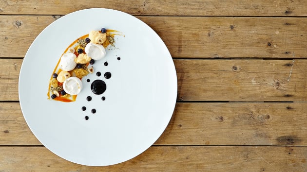 Sea buckthorn with hemp, meringue, sponge toffee and wild blueberries. &copy; S&eacute;bastien Dubois-Didcock.