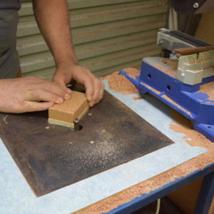 Flush the ply with the cork.