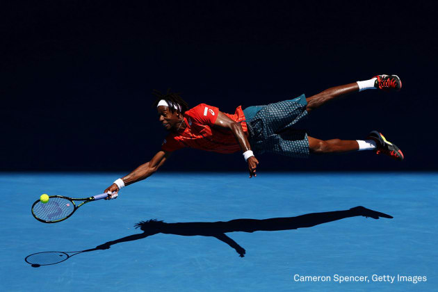 Sports - Second Prize, Singles
Ga&euml;l Monfils of France dives for a forehand in his fourth round match against Andrey Kuznetsov of Russia, during the 2016 Australian Open at Melbourne Park, Australia, on 25 January 2016. The Australian Open holds the record for the highest attendance at a Grand Slam event. &copy; Cameron Spencer, Getty Images.