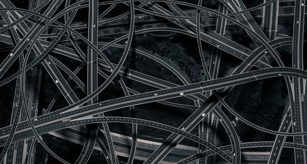 Overlap - Freeway. A variety of urban form and minimalist architecture breaks the old structure, splitting it into triangles, squares and diamond shapes, refracting a new living style on extant spatial structures. Demonstrating a free use of the language of visual forms, it appears like a game, similar to Goldbach&rsquo;s conjecture; the destruction of the ossified template of the city, a visual exploration of breaking the rules. &copy; Dongni, China, 1st Place, Professional, Architecture, 2017 Sony World Photography Awards.