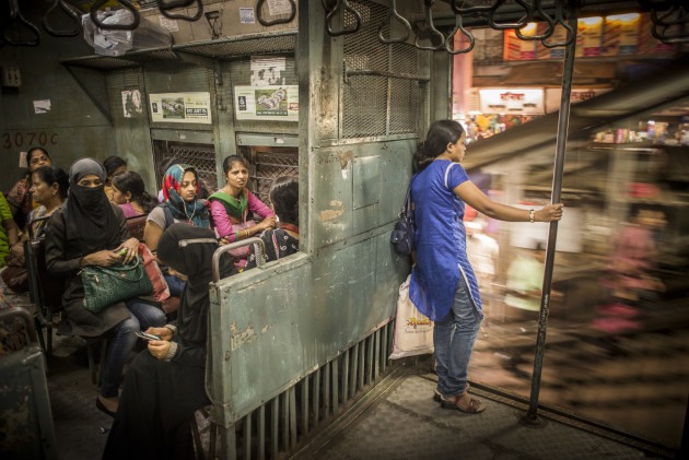 Light and shadow: In the women&rsquo;s carriage, time seems to stand still as the world flies by outside. Nowhere in the world do you find as many travelers making train journeys as in India. Every day, more than 20,000,000 people make a journey with this most vital method of transport. India has the largest rail network in the world, with connections to every far-flung corner of this vast country.It is possible for everyone in India to reach everywhere and anywhere.
&copy; Tamina-Florentine Zuch. (Germany, Winner)