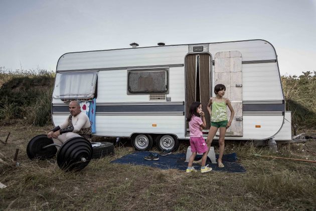 The Strongest Man in the World. After his performance as The Strongest Man in the World, Vitor Manduca sits outside his caravan.
&copy;  Francisco Salgueiro. (Portugal, Shortlist)