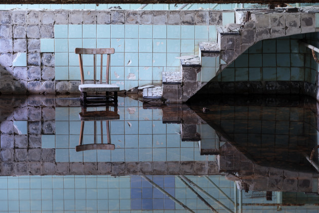 Reflection. A swimming pool in a Pediatric Pathology hospital. The series tells the story of a once beautiful town, Pripyat, that was founded in 1970 as the ninth nuclear city of the Soviet Union, and had to evacuate its 50,000 inhabitants in within 36 hours after the accident at Chernobyl.
&copy; Helen Mountaniol. (Ukraine, Shortlist)