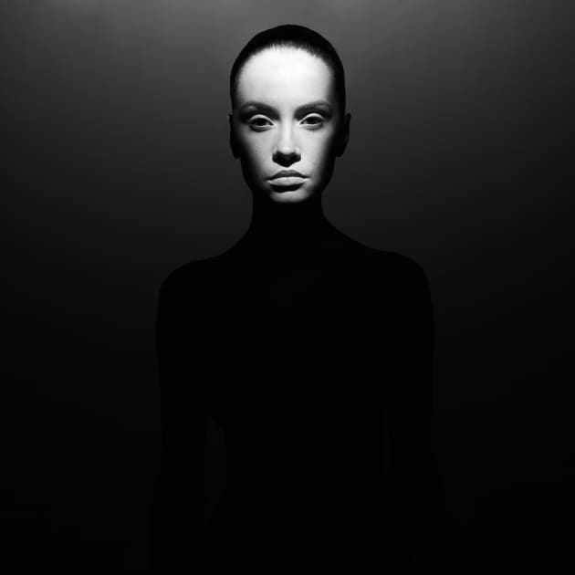 From the series, "Light. Shadows. Perfect woman." Arranging the delicate balance of the correlation of the dark and the light the author discovers the obvious monumentality and duality of the images of the perfect woman. Within the space of the picture, the light becomes flat and the dark becomes deeper, highlighting all conventions and details. With this approach, the geometry of light becomes not only a sculptural language but also correlates with the meaning of the subject. The concept of &ldquo;the perfect&rdquo; in the photographs is contradictory in nature; on the one hand, it is monumental and complete, and on the other hand it is naked and vulnerable. These opposing concepts are at the heart of the works. &copy; George Mayer, Russian Federation, 1st Place, Professional, Portraiture (professional), 2017 Sony World Photography Awards.
