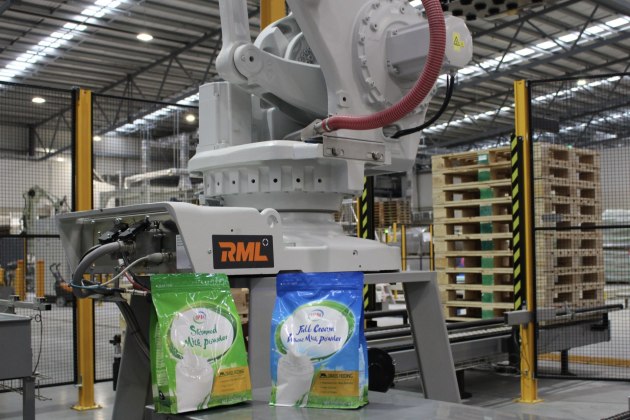 Case packing and palletising system integrated with track and trace capabilities